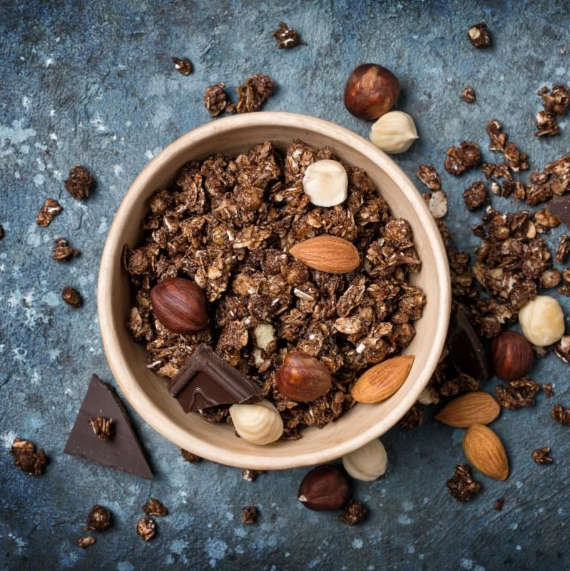 sugar-free, gluten-free, organic granola with dark chocolate sweetened with dates, and sprouted nuts and adaptogens